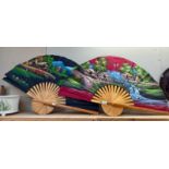 2 Large hand painted oriental wall fans. 101cm x 61cm.