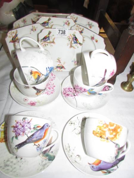 A pretty bird decorated china tea set.
