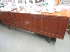 A good teak sideboard. Approximately (84" x 17.5" x 30.5" high) COLLECT ONLY.