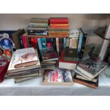 A selection of books, various titles.