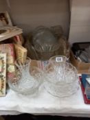 A large box full of cut glass bowls, vases, cake stands, etc.