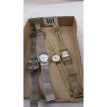 A quantity of ladies wrist watches.