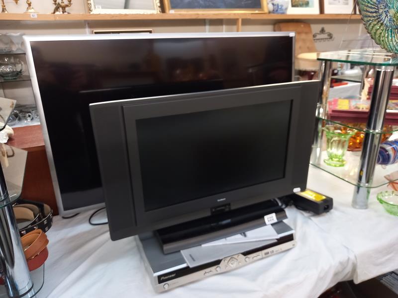 A Goodmans 20" TV, a Samsung 40" TV & a Pioneer DVD player