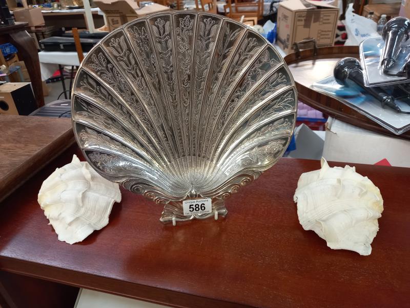 A large silver plated scallop shell dish 28cm x 26cm and 2 clam shells.