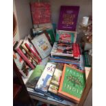 A large quantity of cook books.