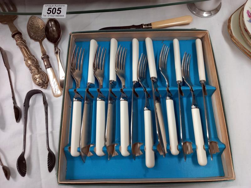 A quantity of silver plated flatware including sugar tongs. - Image 5 of 5