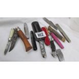 A quantity of old pen knives.