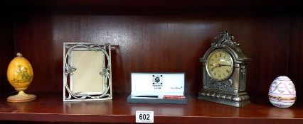 A boxed Macintosh sea gems letter opener and an art nouveau style photo frame, clock, etc.