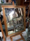 A gilt framed mirror (48cm x 58cm). Collect only