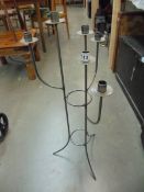 A metal candle stand for six candles, COLLECT ONLY