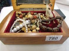 A musical jewellery box and jewellery.