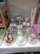 A selection of china cups and saucers.