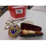 Two silver spoons, a cigarette holder and a mother of pearl plaque etc.,