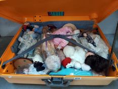 A suitcase of Doll's including Popeye, porcelain black doll & boy Doll etc. Collect only