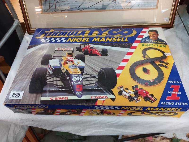 A boxed Formula Tyco Nigel Mansell racing set