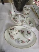 Seven pieces of Wedgwood Hathaway Rose china.