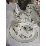 Seven pieces of Wedgwood Hathaway Rose china.
