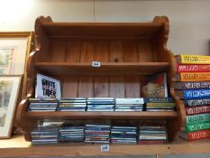 A pine wall shelf.