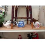 A selection of vintage teapots including blue and white George Jones.