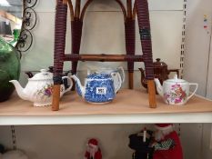 A selection of vintage teapots including blue and white George Jones.