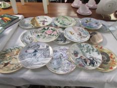 17 Japanese bird decorated collector's plates.