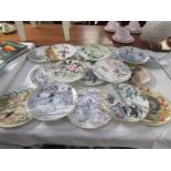 17 Japanese bird decorated collector's plates.