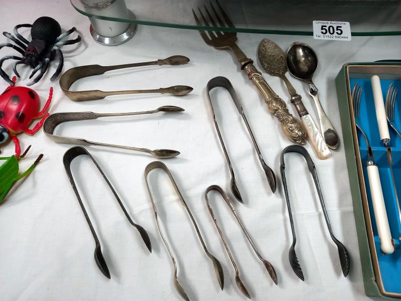 A quantity of silver plated flatware including sugar tongs. - Image 4 of 5