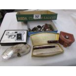 A mixed lot including pistol lighter, fountain pen, badges, buttons etc.,