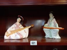 2 Japanese Geisha pottery figures