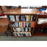 An oak veneer bookcase 83 cm x 33cm x 109cm.