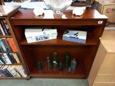 A mahogany bookcase. 91cm x 30cm x height 103cm.