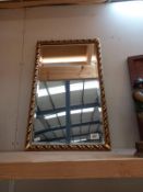 A gilt framed mirror. COLLECT ONLY
