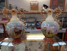 A pair of large mantle vases with horse scenes, signed L.Reid (1 A/F), Collect only