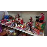 A good selection of Christmas tree decorations and lights and Santa figures.