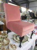 A pink upholstered chair on Queen Anne legs. COLLECT ONLY.