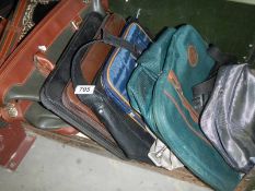 A quantity of attache' cases and other bags.