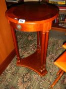 A good quality mahogany six leg circular table.