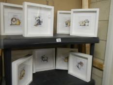 Ten framed and glazed cross stitch pictures.