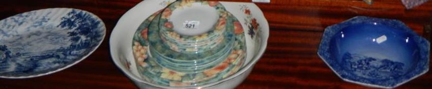 A mixed lot of ceramic plates, bowls etc.,
