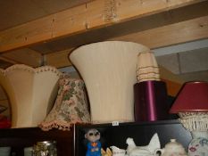 A mixed lot of lamp shades.