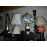 A mixed lot of table lamps including lava lamp.