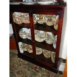 A mahogany two door glazed display cabinet.