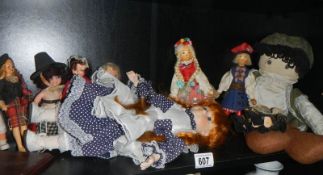 A mixed lot of costume and other dolls.