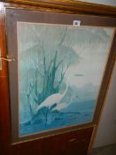 A framed and glazed signed Chinese print of cranes.