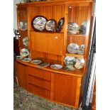A good quality teak display cabinet.