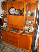 A good quality teak display cabinet.