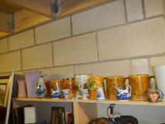 A mixed lot of tankards etc.,