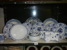 A mixed lot of blue and white ceramics.