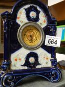 A ceramic mantel clock.