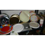 A mixed lot of disposable paper plates.